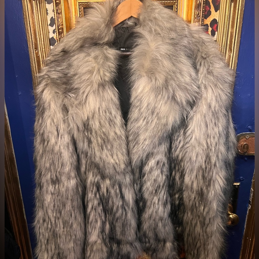 ASOS. Size large. Faux fur. New. Never worn